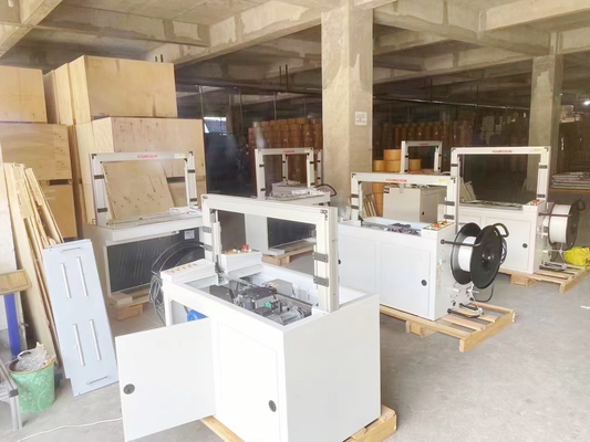 อัตโนมัติ Box Case Carton Strapping Machine อัตโนมัติ Strapping Machine pp belt Strapping Machine สําหรับการผูกผูกผูกผูก